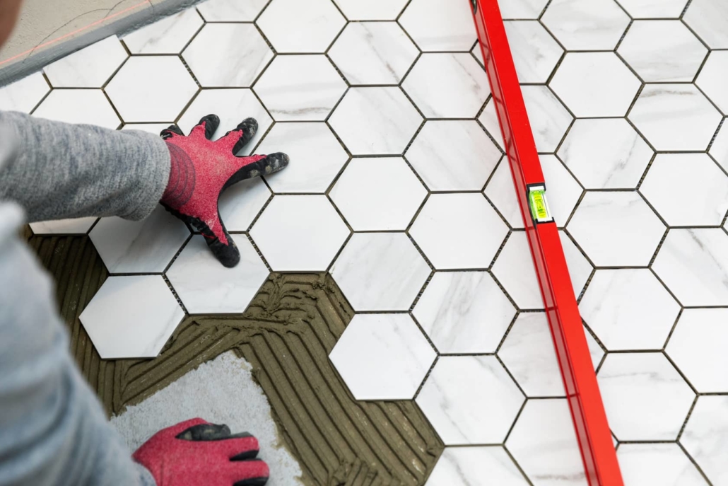 Tiling is difficult so using a professional for the floor or walls is key. 