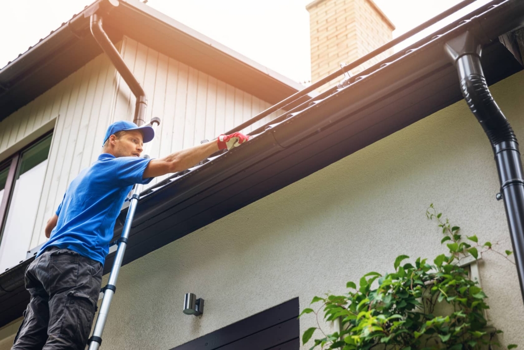 Cleaning out gutters so water does not back up. 