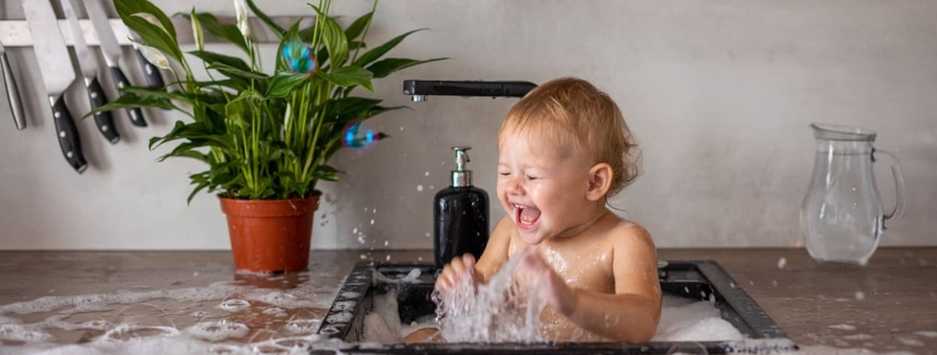 Bath water is tepid so baby is not burned.